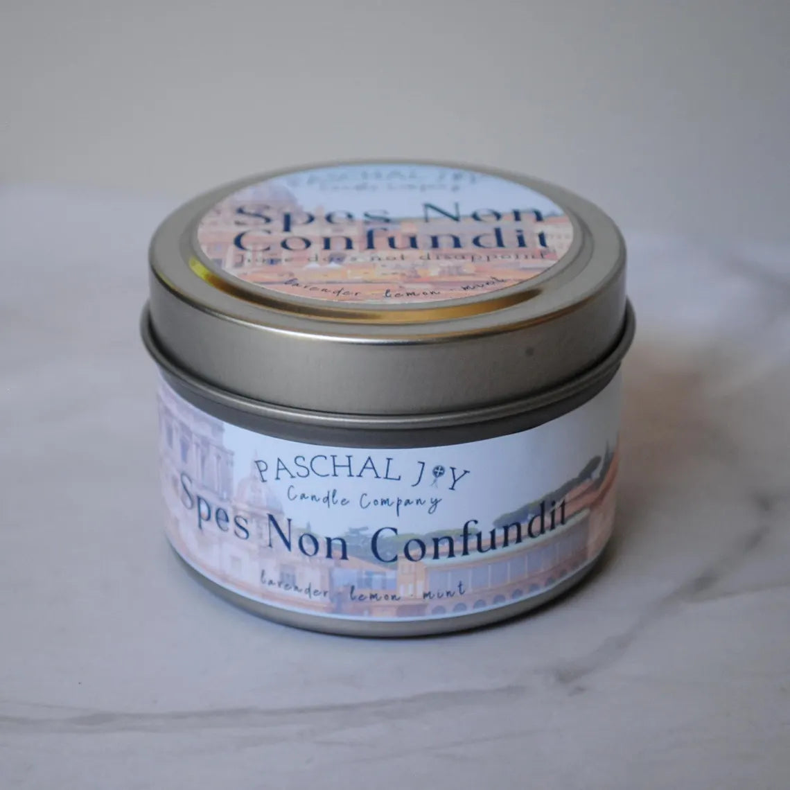 Spes Non Confundit Candle Tin on grey background