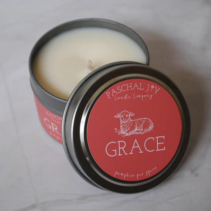 Small candle tin with shot of orange lid