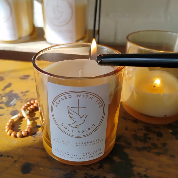 Chrism candle being lit