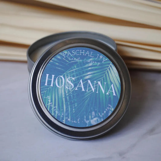 Hosanna Palm Sunday Candle tin with palm leaves in background