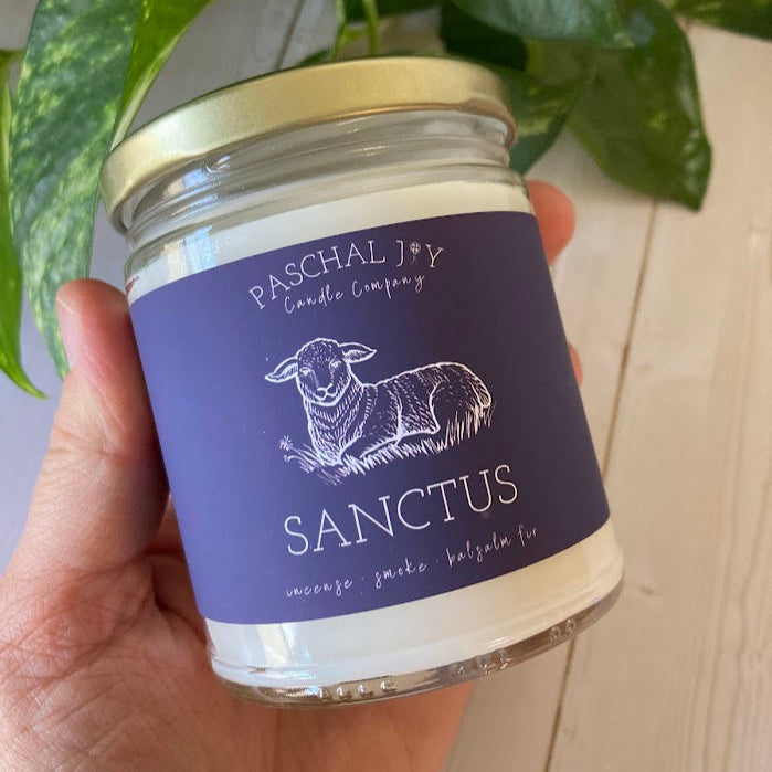 Sanctus Candle being held in hand
